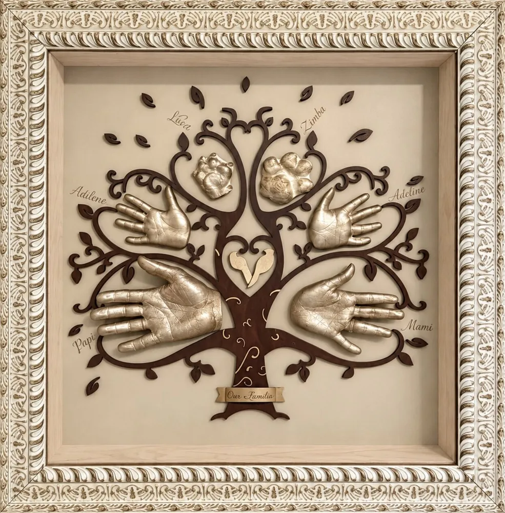 A family tree of gold hand casts on the branches, in an ornate cream frame